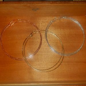 Pretty large hoop earrings.